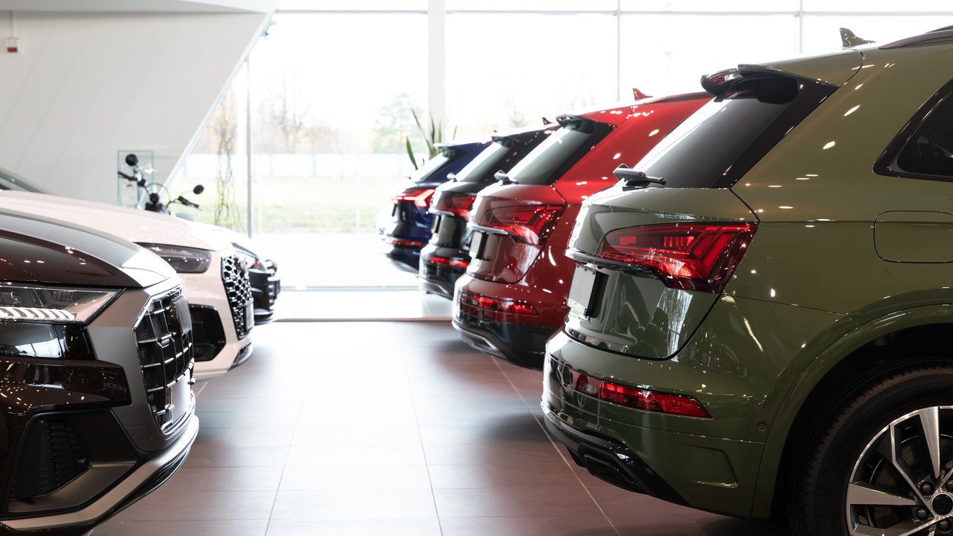 Dealership Car Showroom of Premium SUVs, Cars in a Row, Rear View